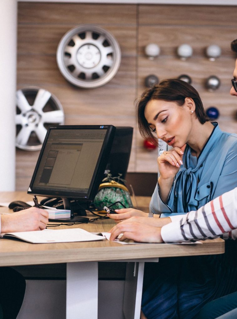 family-buying-car-dealer